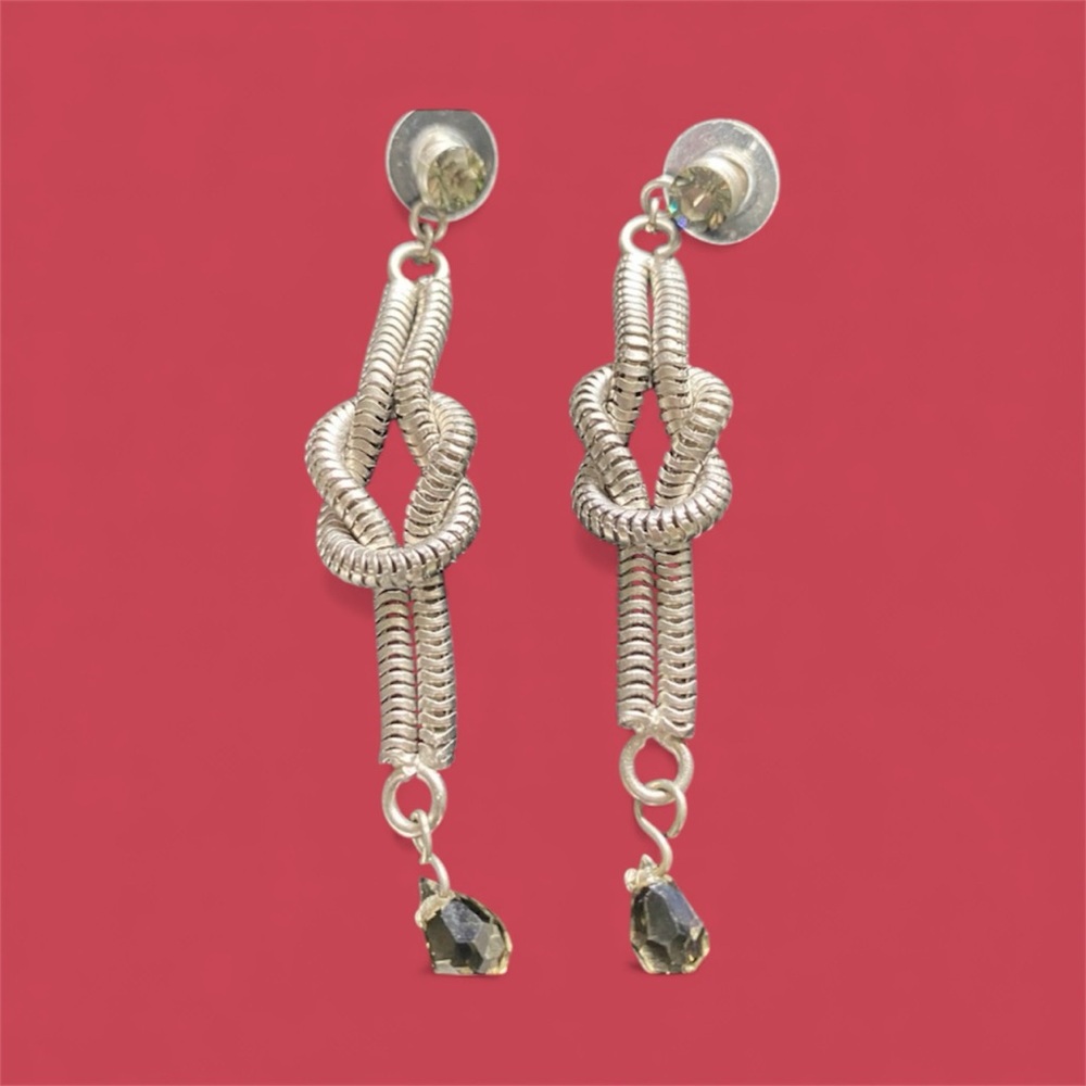 Stunning silver/gunmetal earring, with smoky CZ on the ear and at the "bottom"